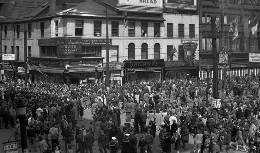 Stella Curtis was among this crowd at the Corner of King Street and  James St. In Hamilton on VE Day, May 8, 1945. Photo courtesy of the Hamilton Public Library.