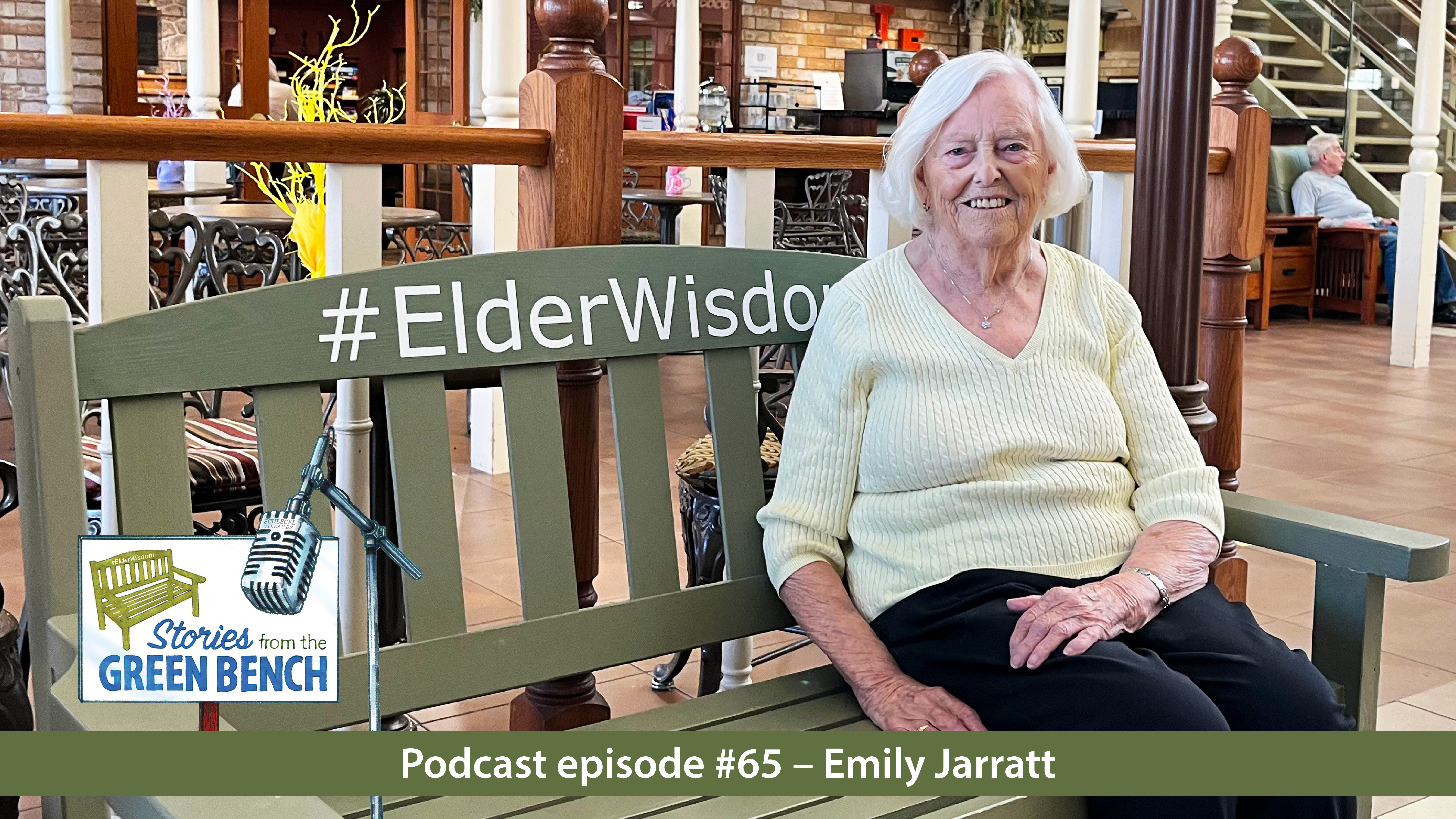 Emily Jarratt sitting on the green #ElderWisdom bench at The Village of Tansley Woods