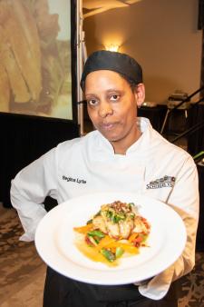 Regina shows off her winning dish. 