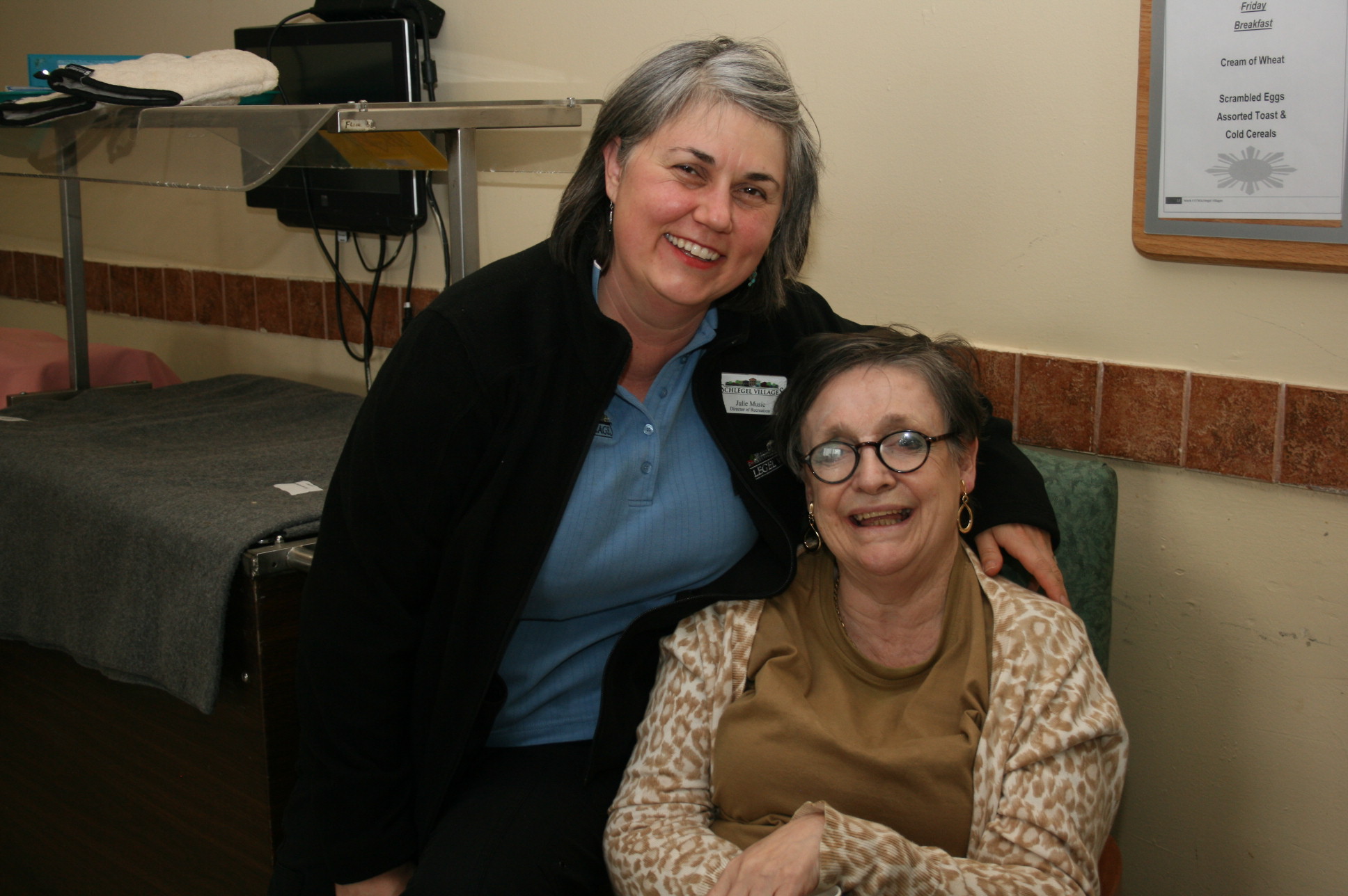Team member hugging resident