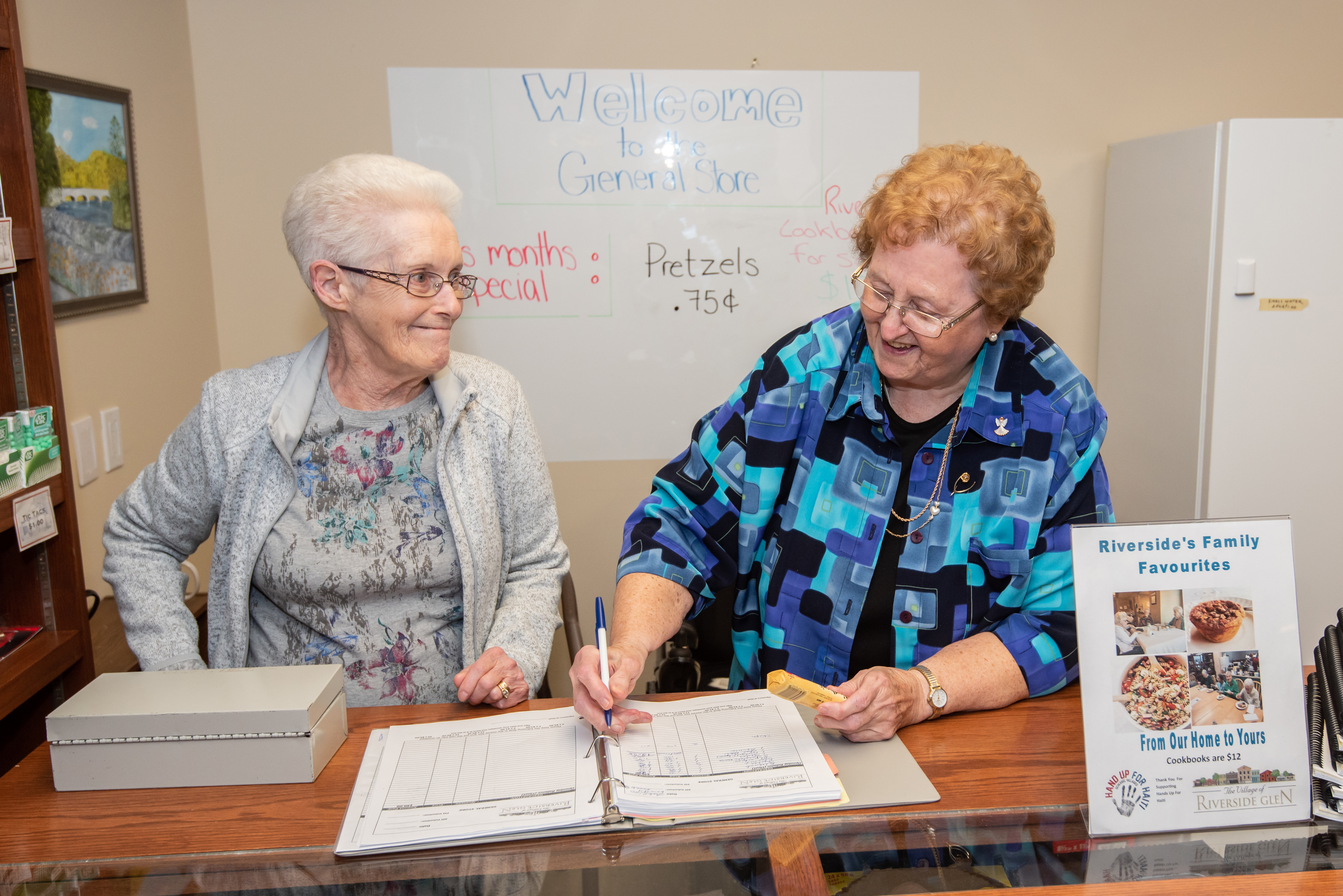 Volunteers working in the Village General Store