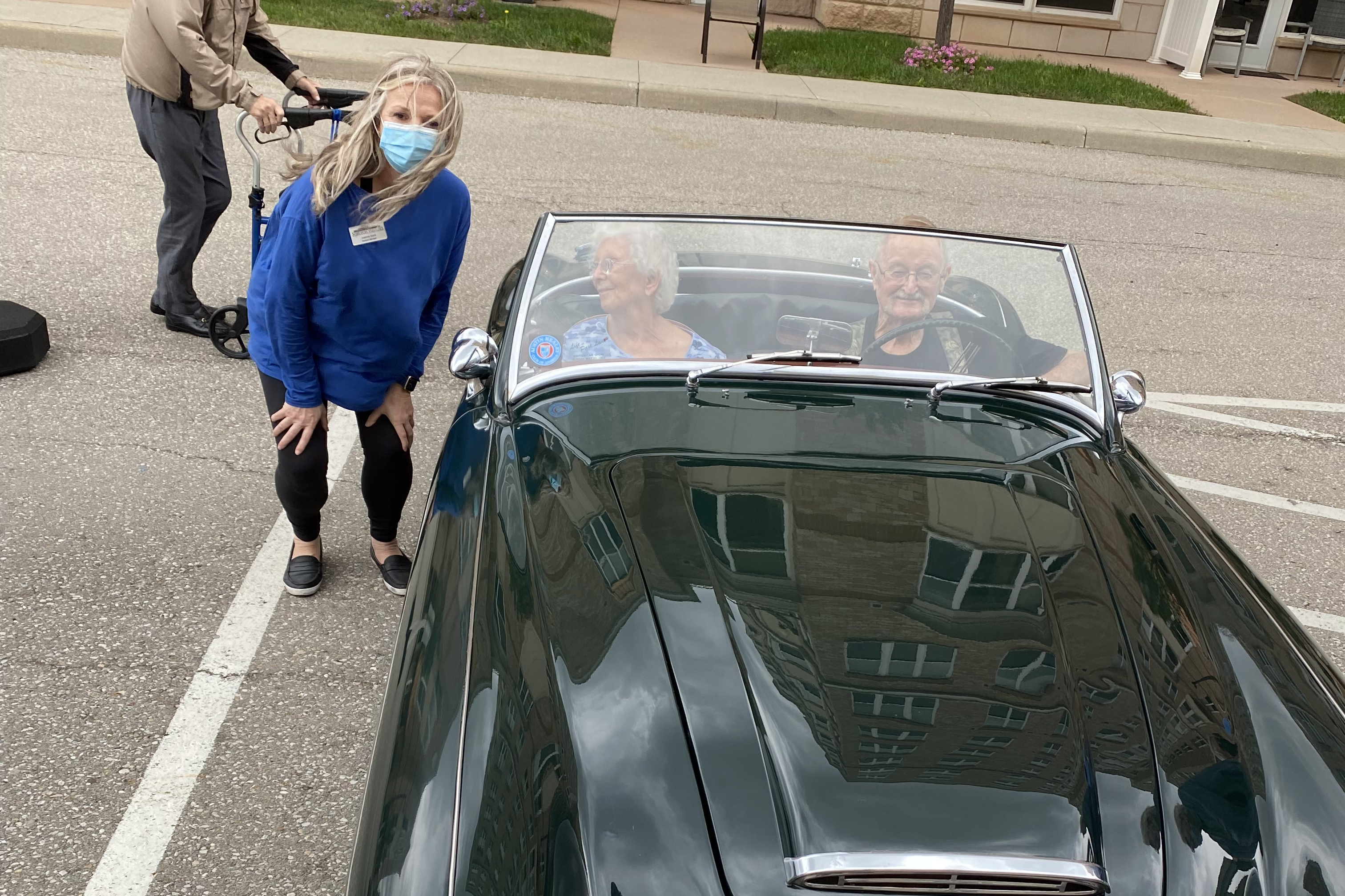 Garrie and David in their Austin-Healey, with Tansley Woods General Manager Jo-Anna Gurd standing aside. 