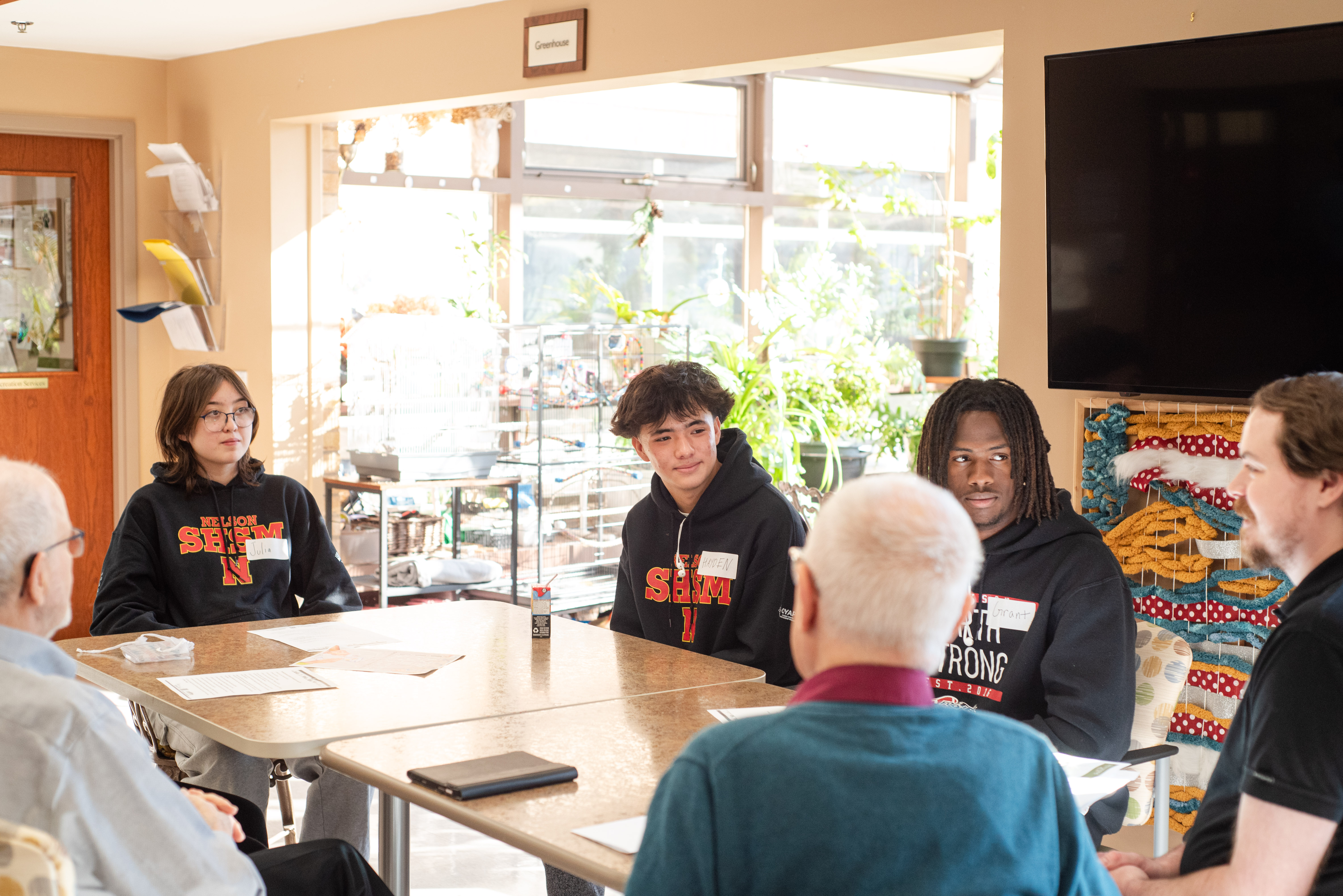 High School Students engage with residents during a SHSM program at The Village of Tansley Woods