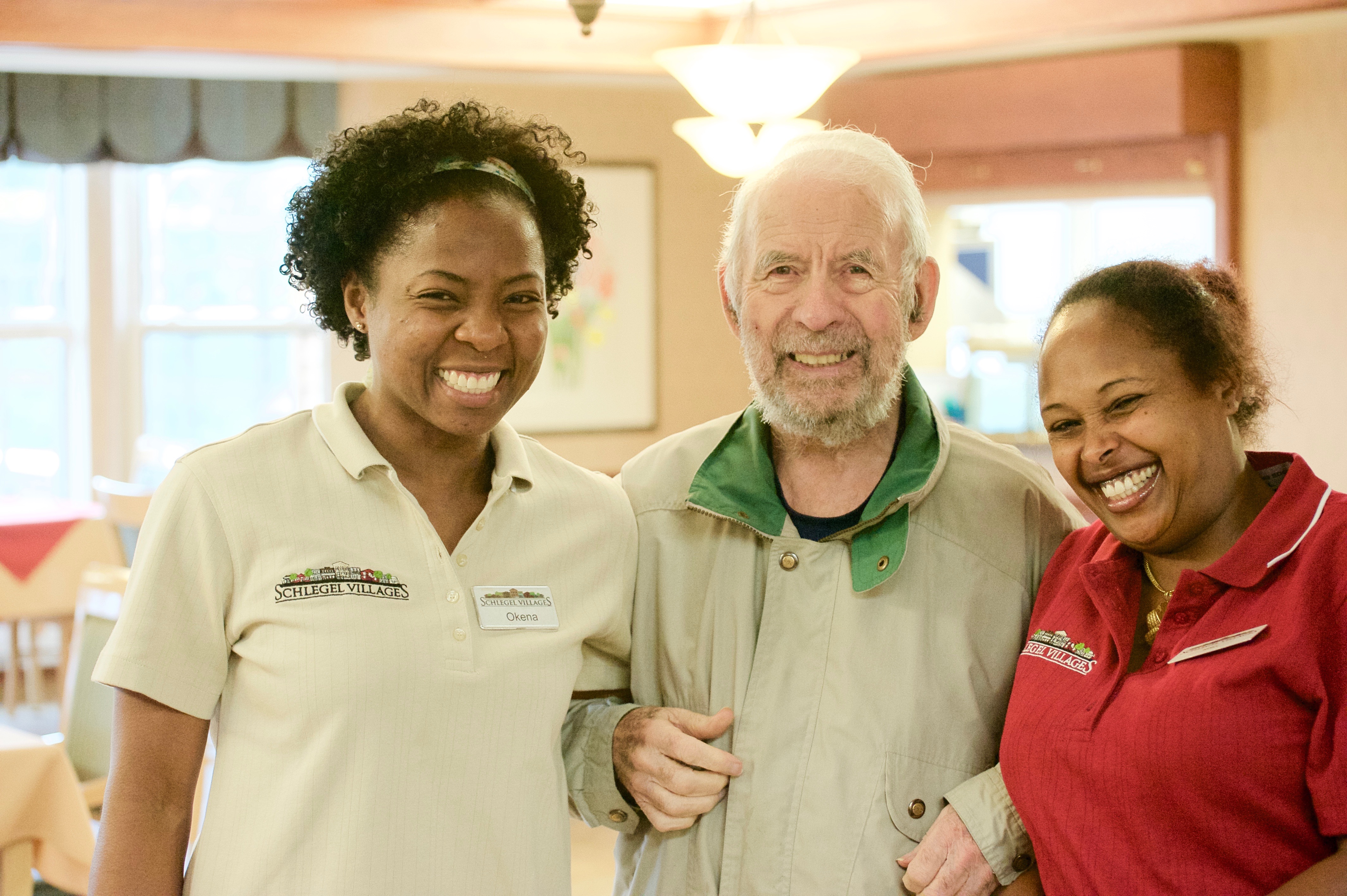 Two team members with a resident