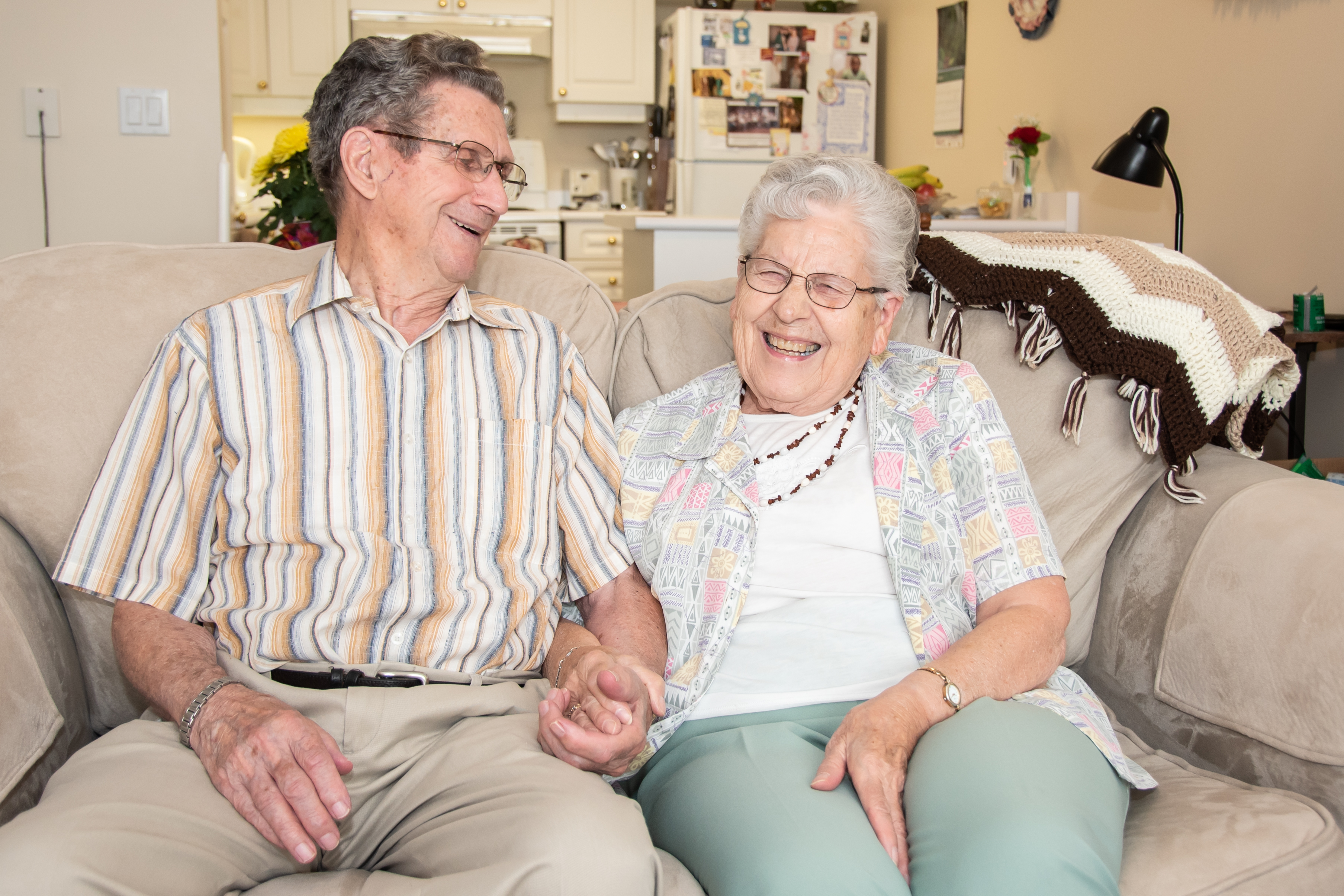 Senior Couple enjoy each others company in their apartment