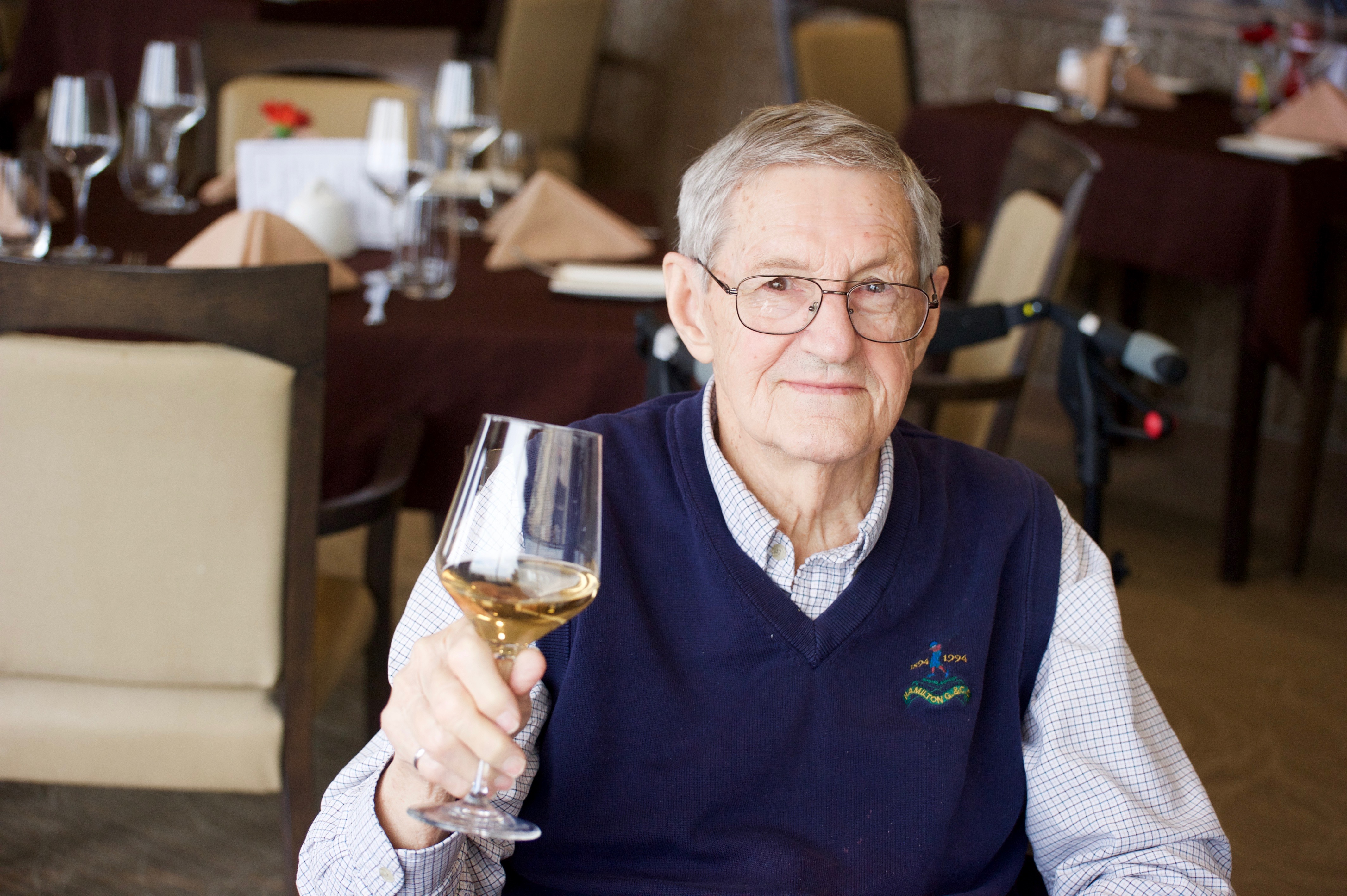 Man drinking a glass of wine