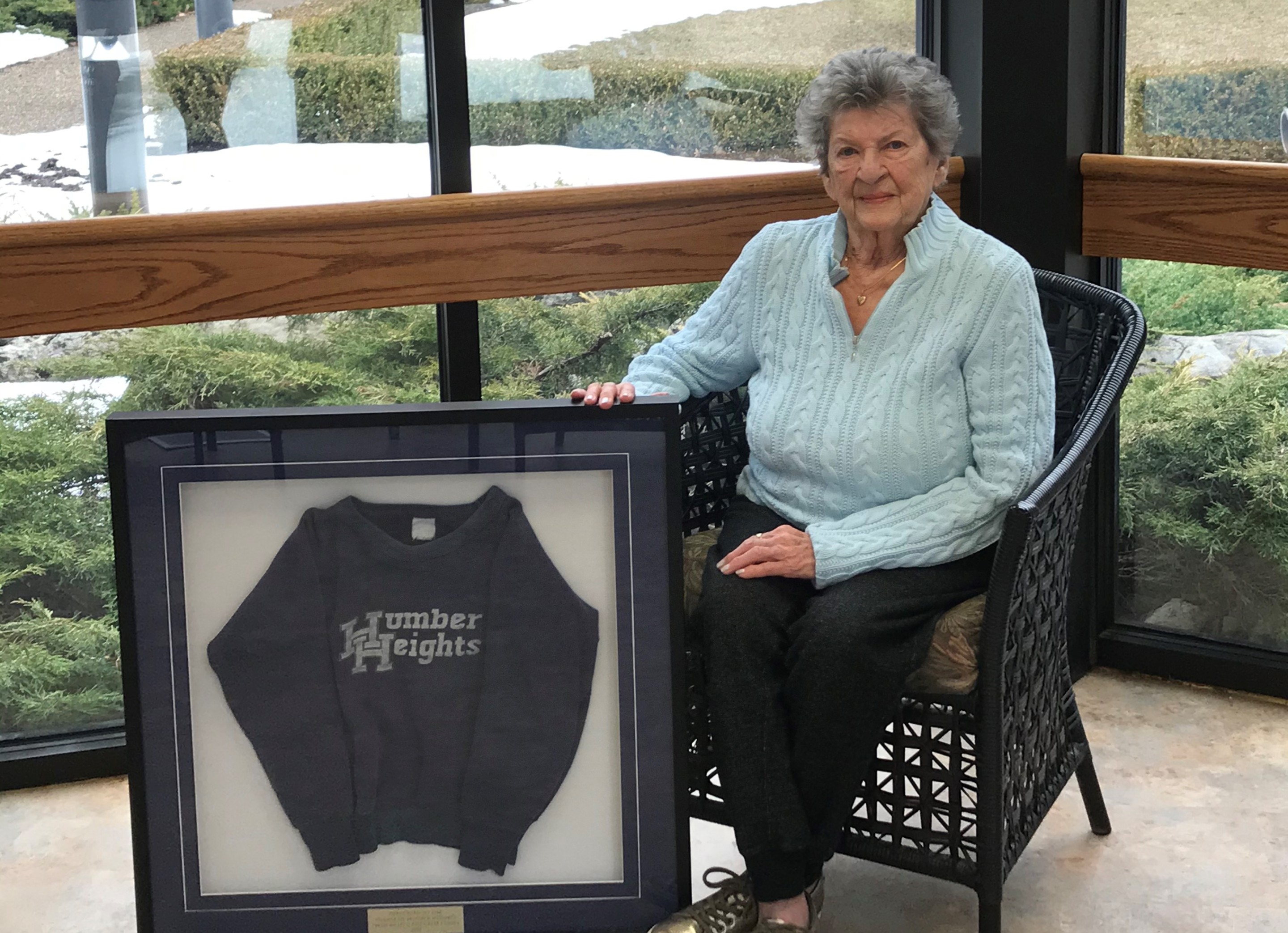 Ruth sits alongside the sweatshirt from Humber Heights school she gave her son more than 40 years ago.