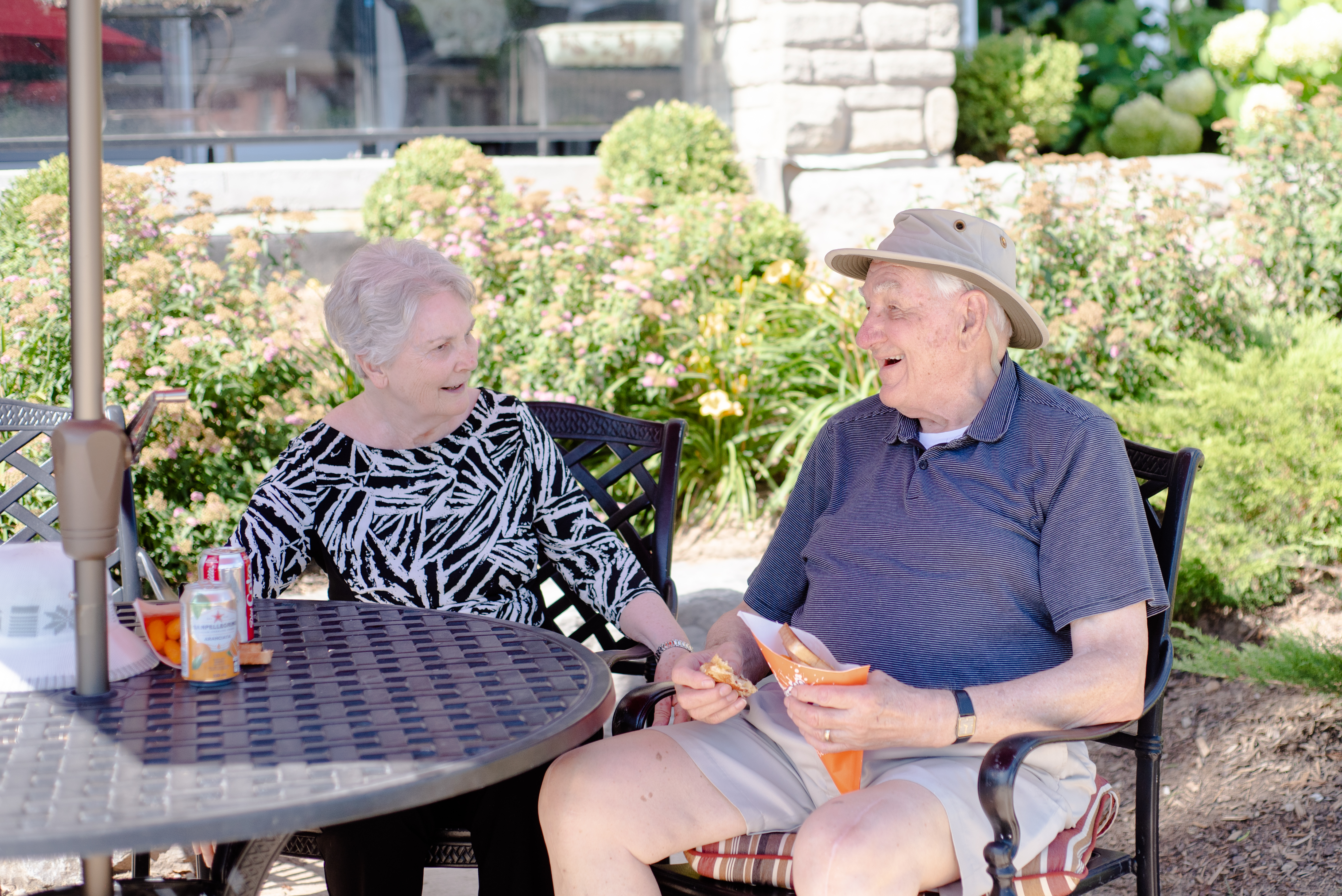 Resident couple enjoying the patio at Ailsa Craig