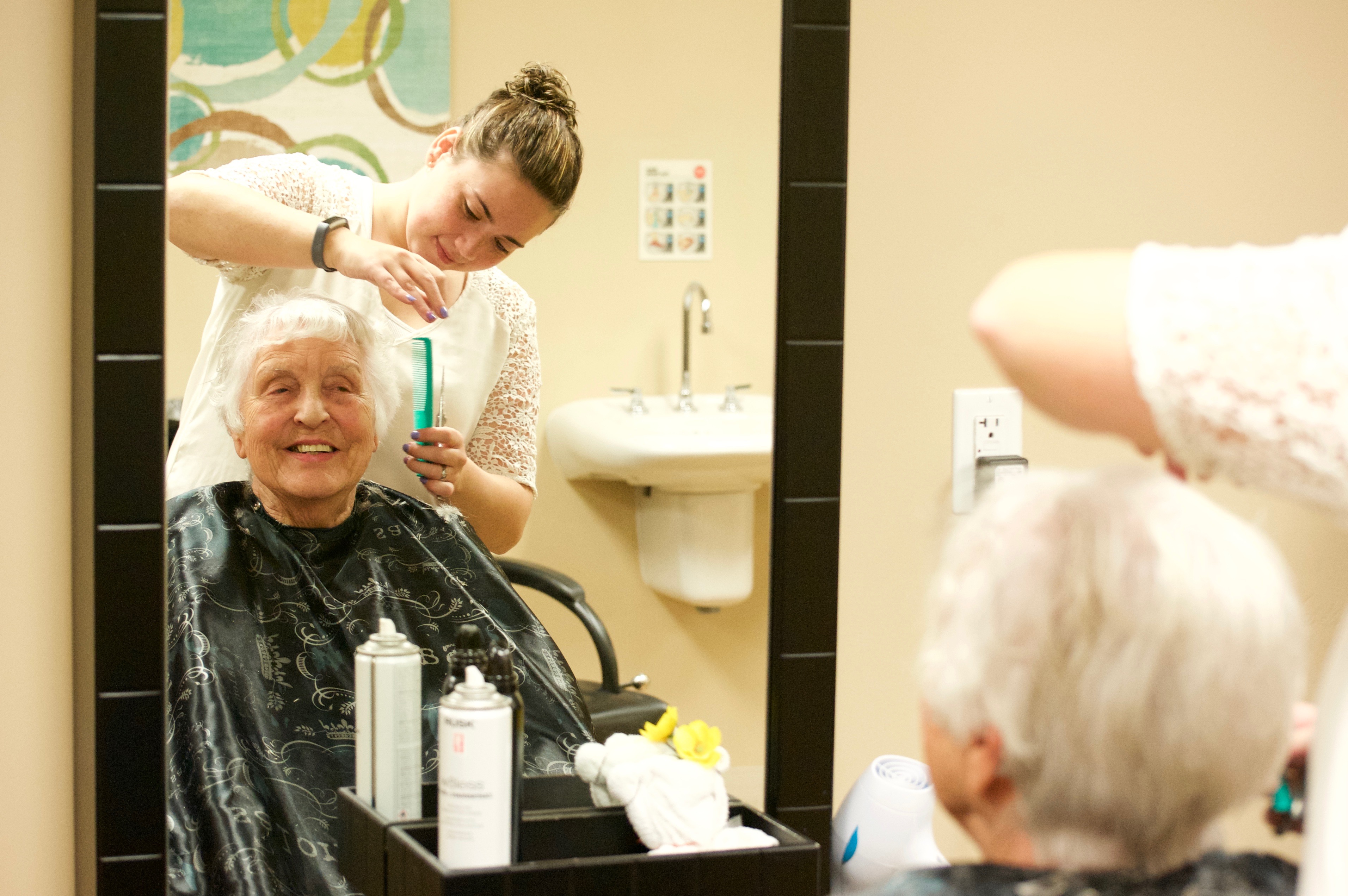 Resident getting a haircut in The Riverstone Spa and Salon