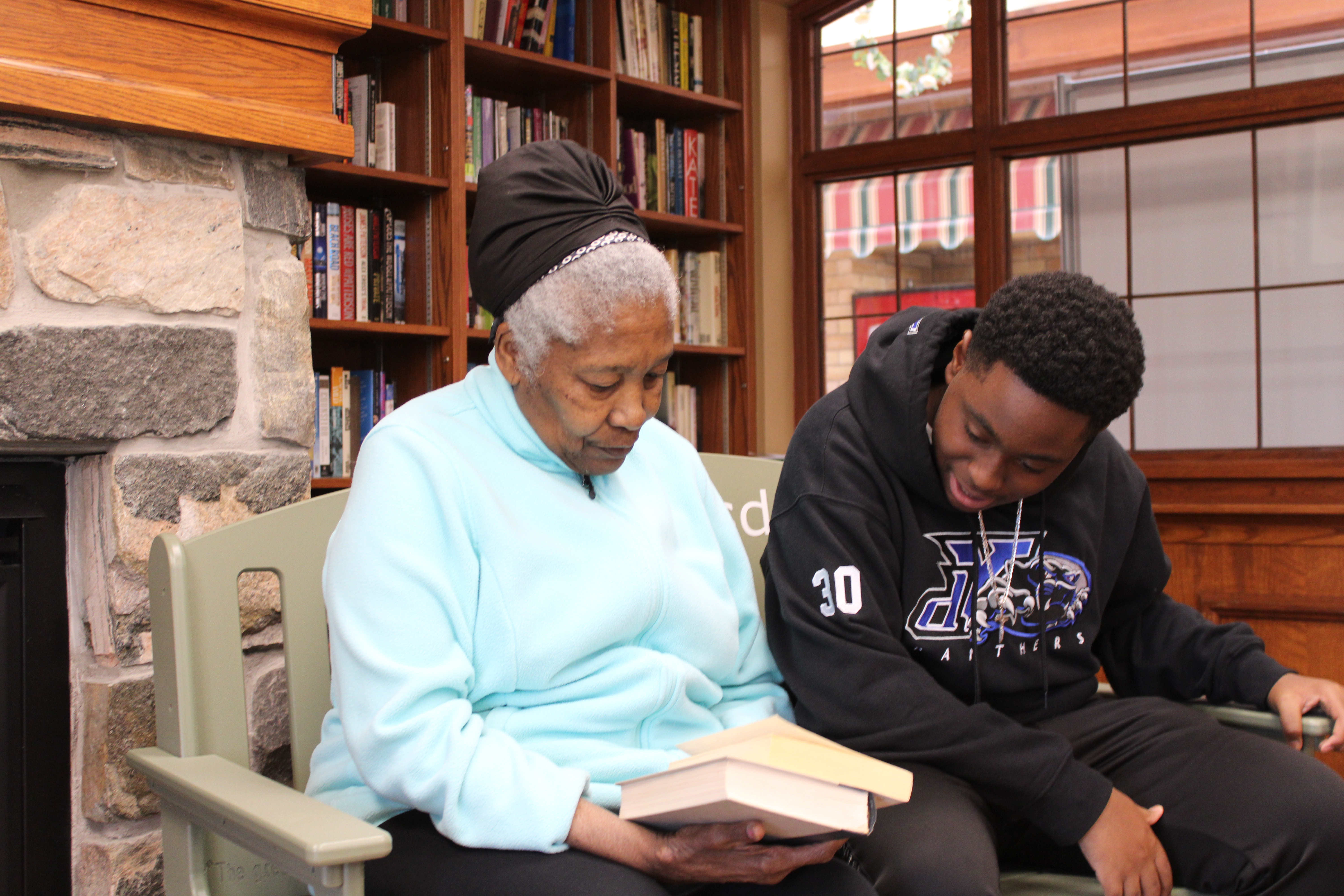 Intergenerational conversation on The Green Bench