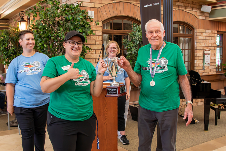 The Village at University Gates receives the winning Schlegel Olympics Trophy for the West Villages