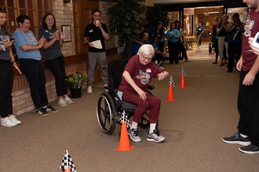 Resident competing in the Canoe Slalom event at the Schlegel Olympics