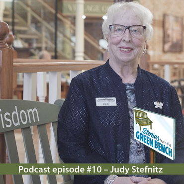Judy Stefnitz sitting on the green bench for podcast episode #10 of #ElderWisdom | Stories from the Green Bench