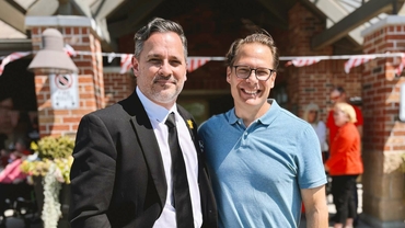 St. Clair College President Michael Silvaggi and Schlegel Villages President Jamie Schlegel pose for a picture on the 10th anniversary of The Village at St. Clair