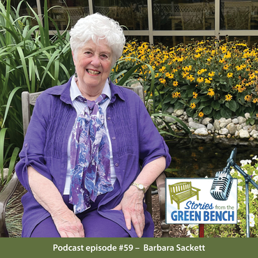 Barbara Sackett poses in the garden for the podcast episode