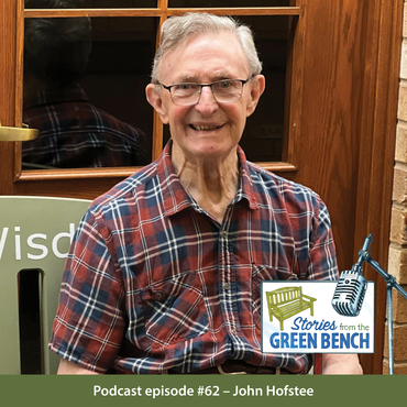 John Hofstee sitting on the Green Bench for his #ElderWisdom podcast