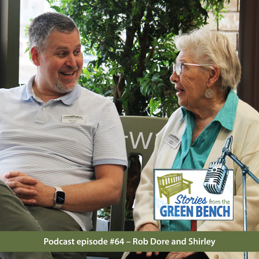 Rob and Shirley in a conversation on the green bench in promotion of their #ElderWisdom podcast episode
