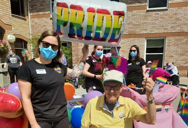 Gary leads the Pride Parade at Riverside Glen
