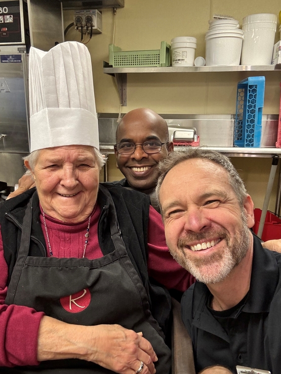 Angelica,. Nimal and Michal pose in the kitchen of the Ruby. 