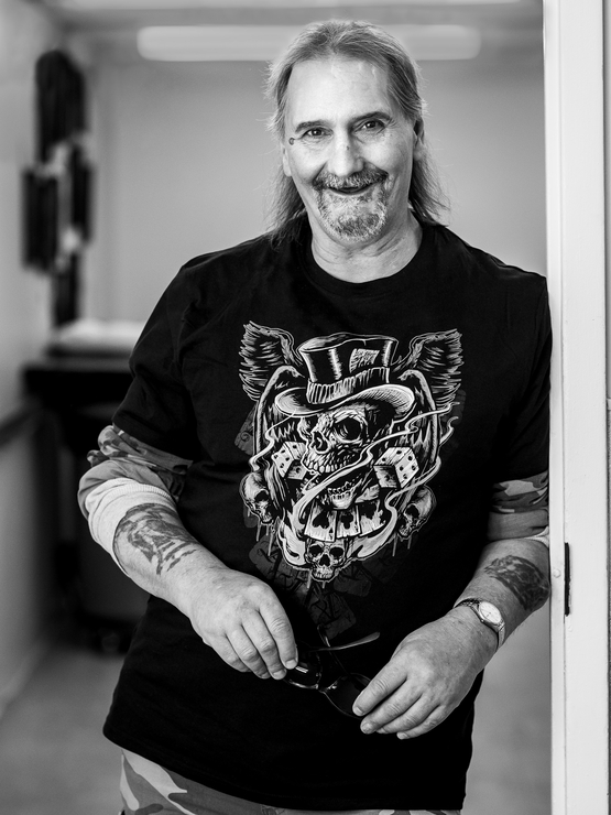 Ben Signorile black and white portrait showcasing his passion for motorcycles