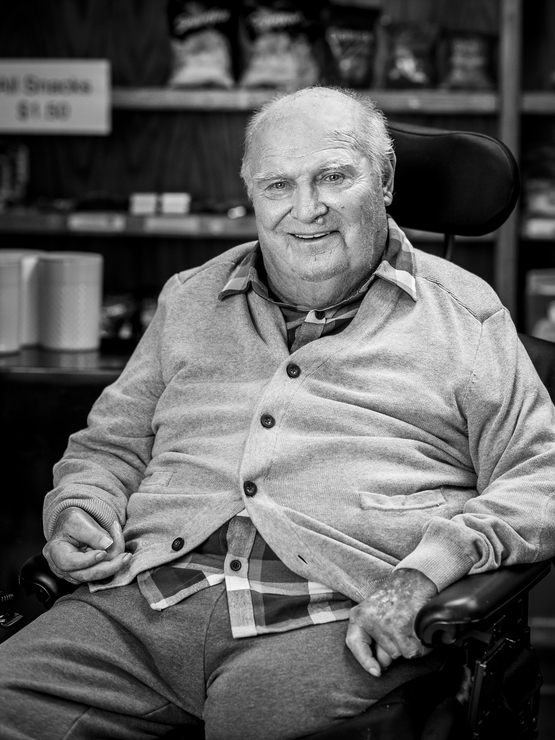 Brian Leyes black and white portrait in the general store at the Village of Taunton Mills