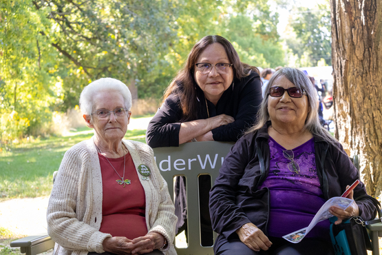 Elders from Schlegel Villages and the Six Nations on the Grand share space upon the Green #ElderWisdom Bench. 