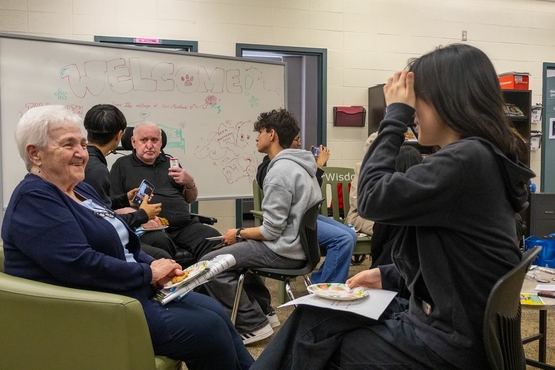 Evelyn shares conversation with a young student from John Fraser Secondary School.
