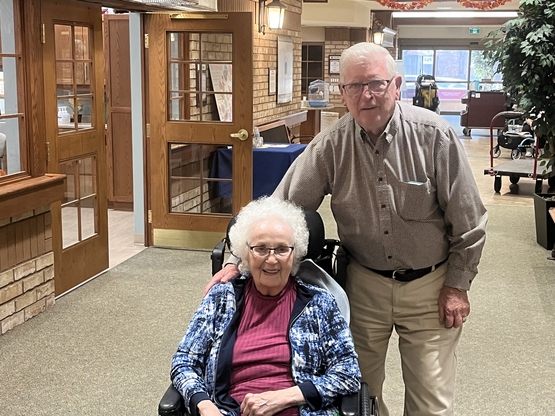 Frank and Pat pose together along Main Street at Wentworth Heights during one of their regular walks through the Village. 