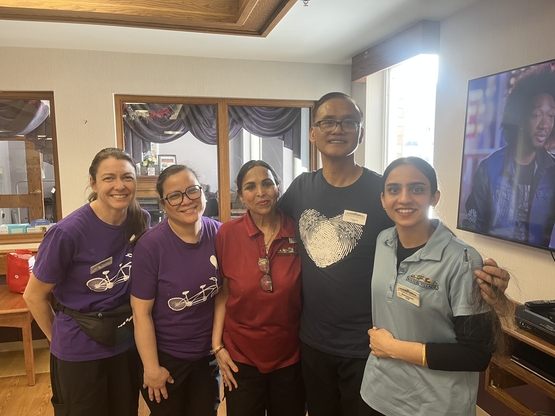 Edgardo stands with some of his fellow Team Members from the Meadowvale neighbourhood of the Village of Erin Meadows.