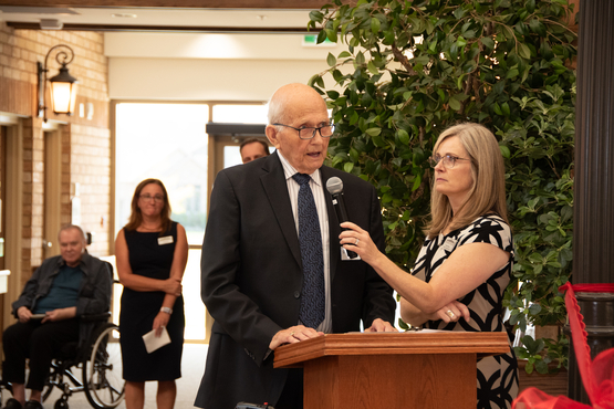 Jack Eizenga shares his words of wisdom from the podium at The Village of Glendale Crossing's grand opening celebration. 