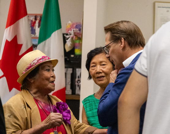 Jamie Schlegel speaks with two members of the Maple Seniors Club during the announcement in Vaughan, Ontario, where the latest Schlegel Village will be built.  
