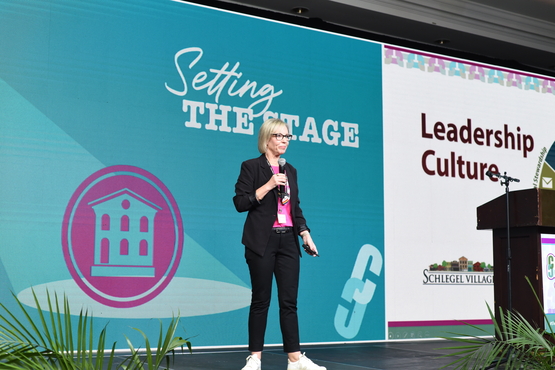 Vice President of People, Christy Parsons, welcomes leaders to the annual retreat.