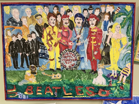 One of Perry's paintings is a colourful depiction of The Beatles - he often gets inspiration from bands and musicians.