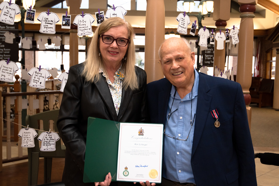 Ron Schlegel receiving the King Charles III Coronation Medal