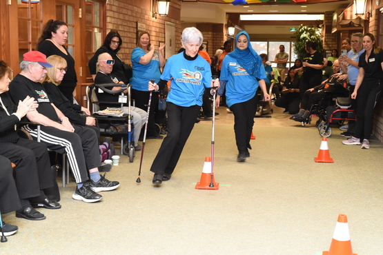 A resident from Taunton Mills weaves through the Slalom portion of the Triathlon event.