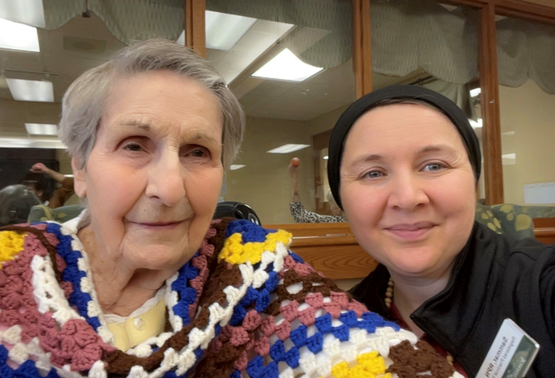 Sammar Poses with one of the residents she serves at The Village of Tansley Woods. 