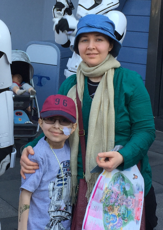 Sammar stands alongside her son, Taeem, whose tragic death from cancer was a catalyst behind her choice to become a nurse.  
