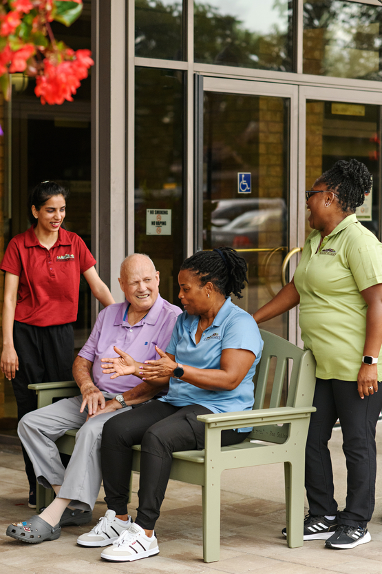 Ron shares conversation with three Schlegel Villages team members. Ron always took a keen interest in the lives of everyone connected to the Villages. 
