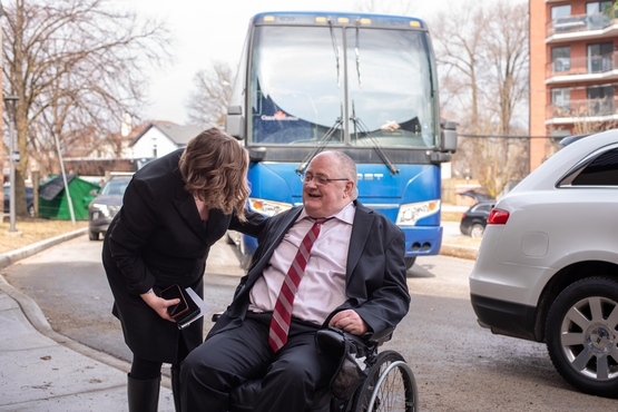 Tom Farr, one of the featured residents of Schlegel Villages greets director Sarah Fodey at the premiere of The Green Bench Documentary.