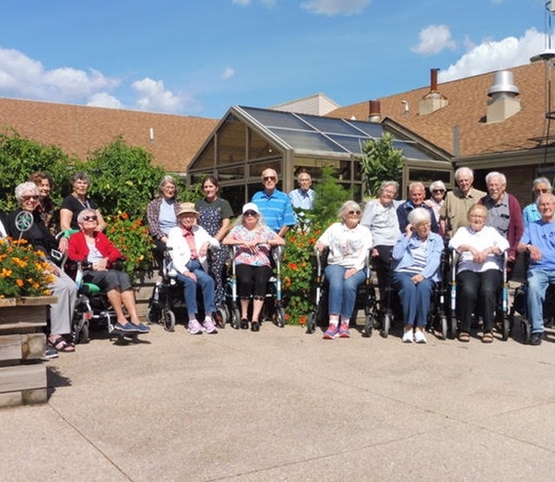 The garden club is pictured outside Wentworth Heights during the 2025 growing season.
