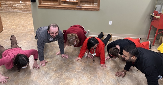 Members of the Winston Park pushup team demonstrate their skills. 