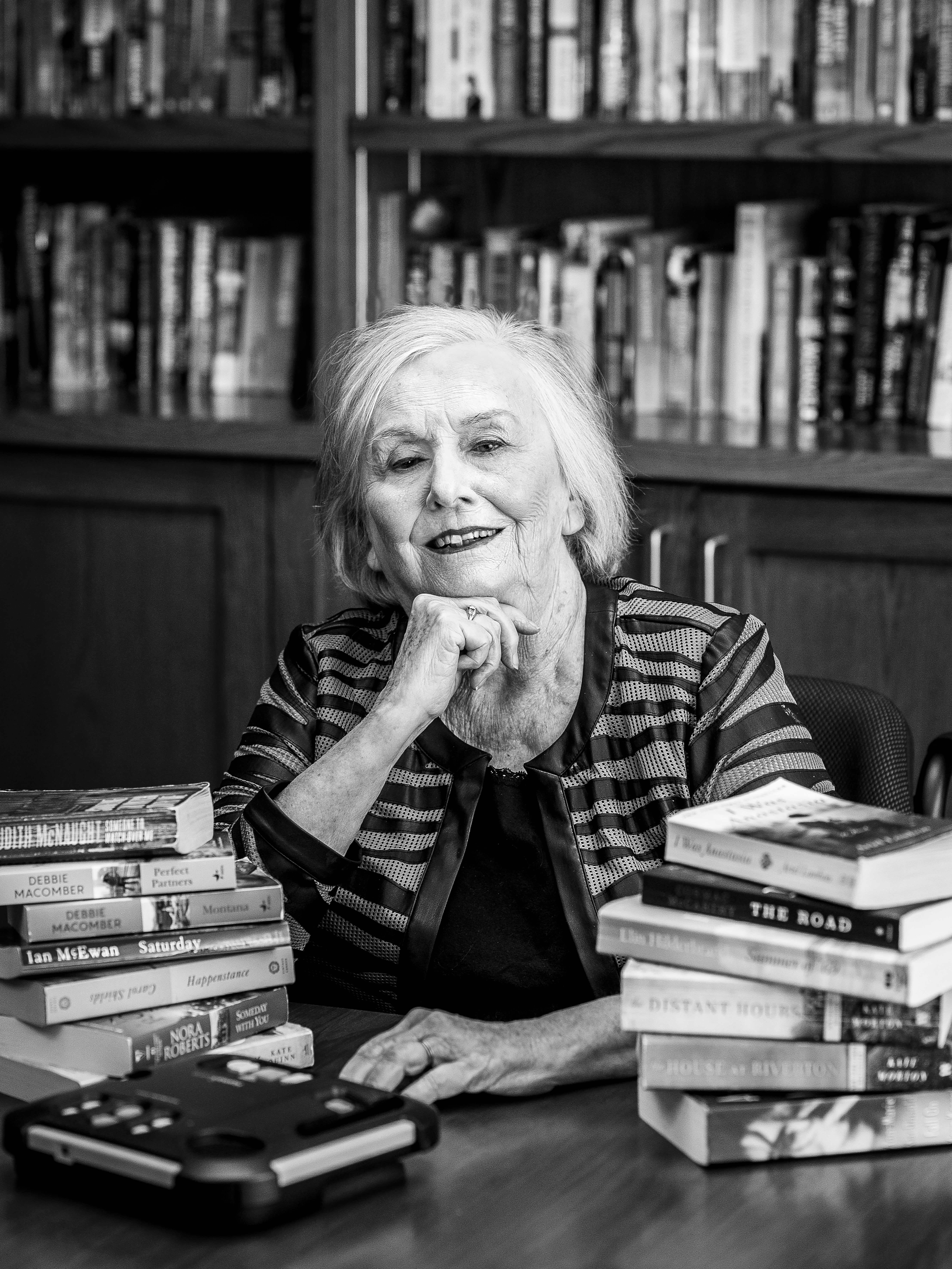 Marcy Brown black and white portrait showcasing her love for book club