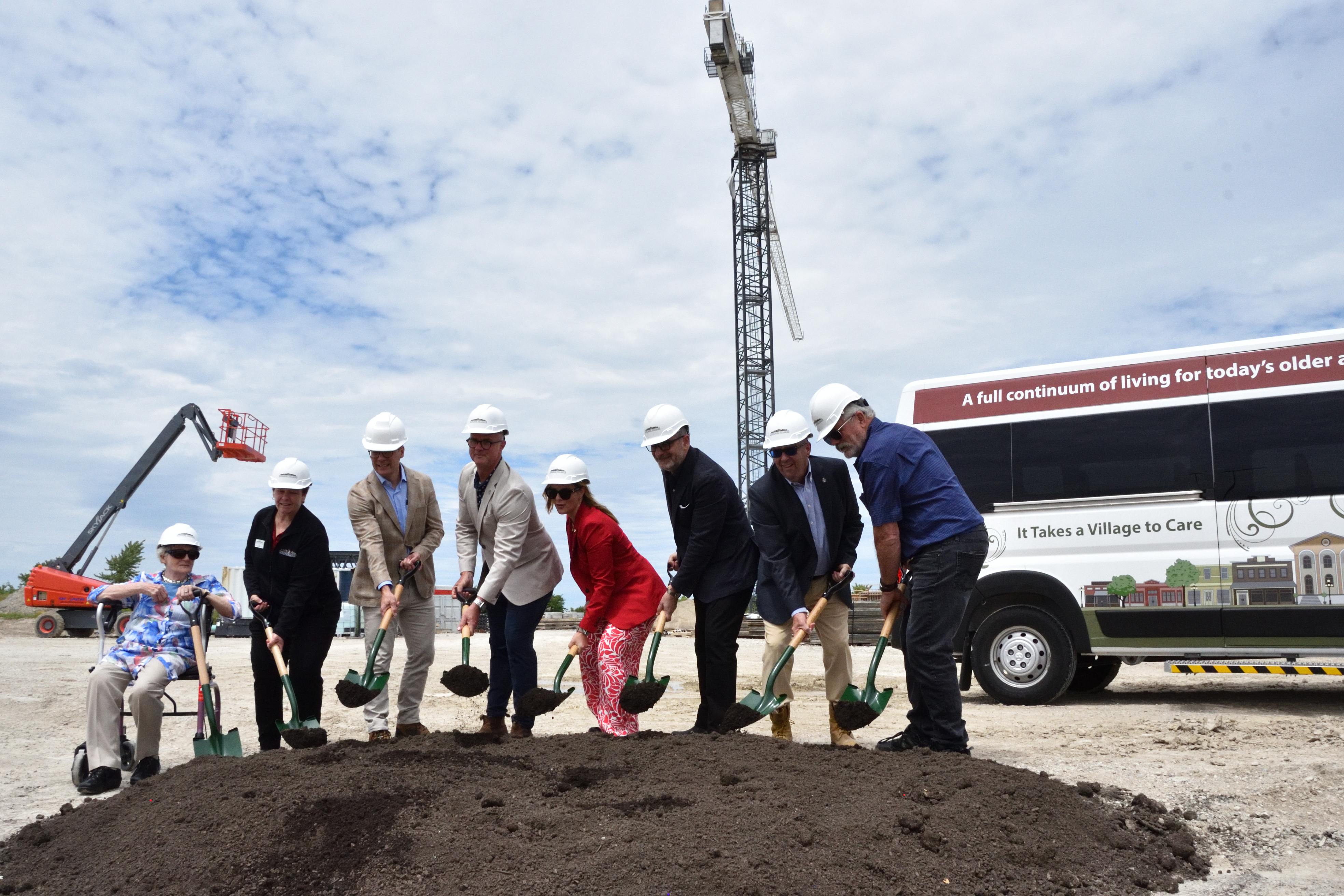 Dignitaries turn dirt on the construction site during the announcement of a new Schlegel Village long-term care in Whitchurch-Stouffville, The Village of Stouffer Mills