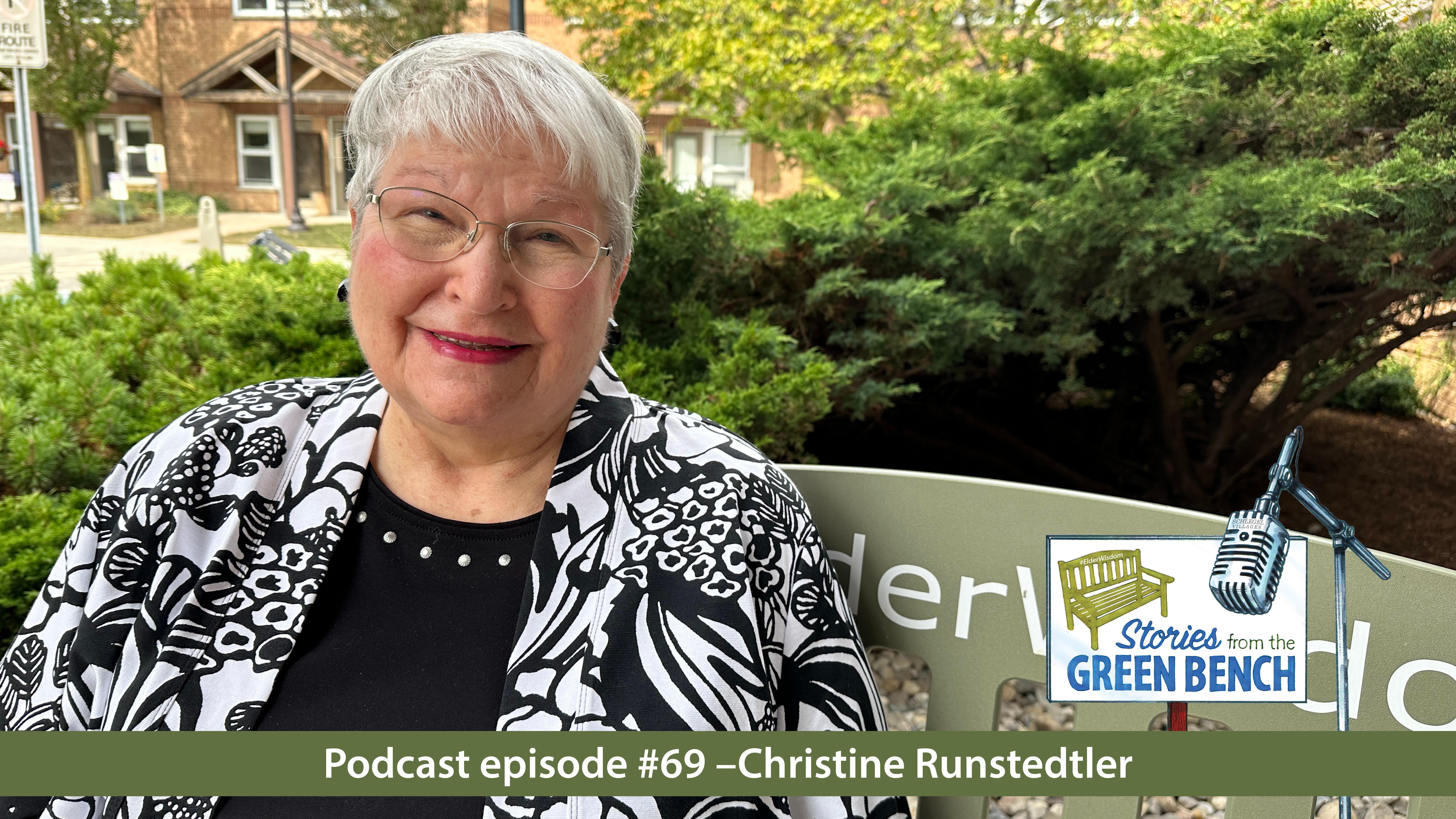 Christine sitting on the #ElderWisdom bench in promotion of the stories from the green bench podcast