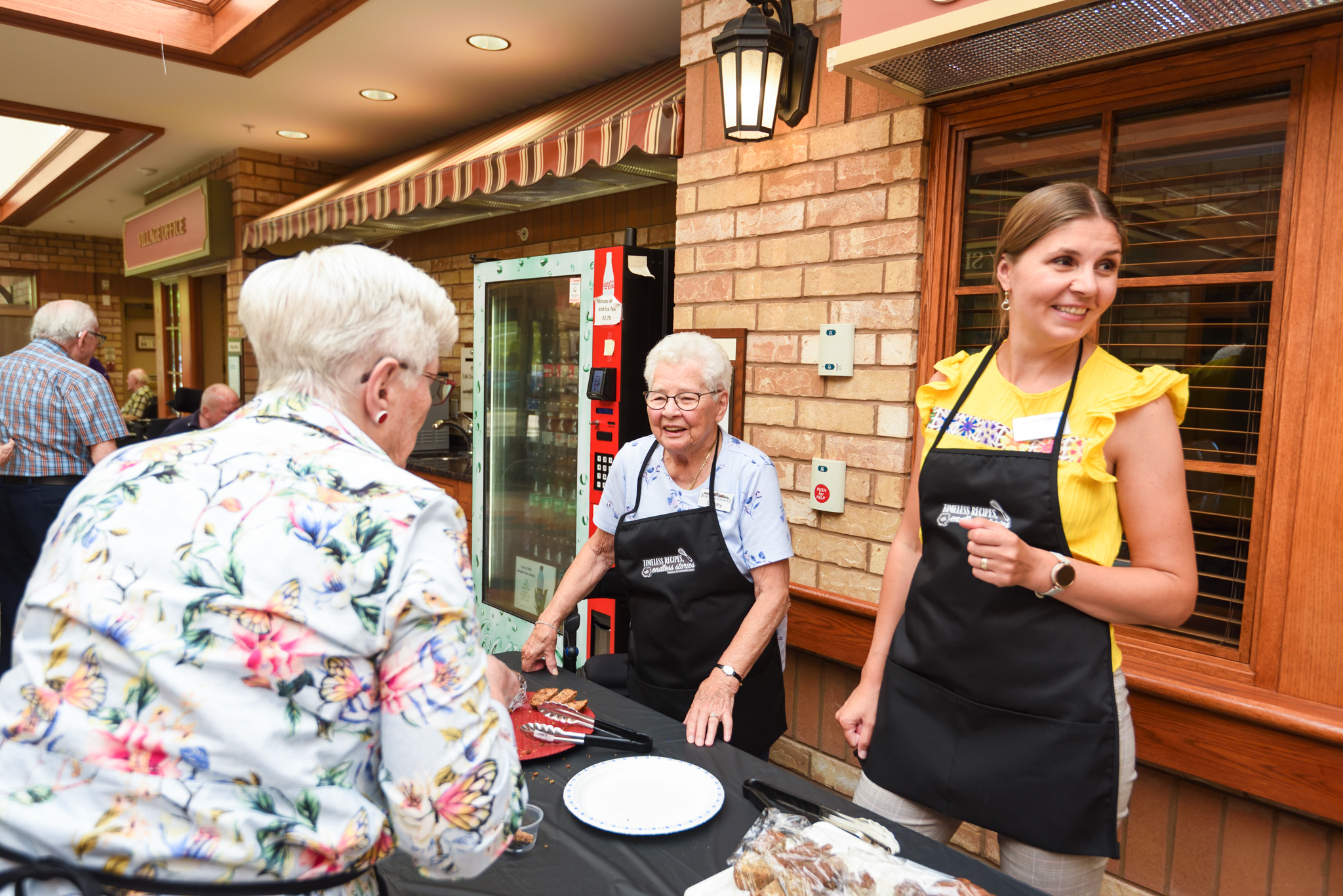Residents and team member come together at University Gates during a tasting competition as part of the Pursuit of Passions event. 