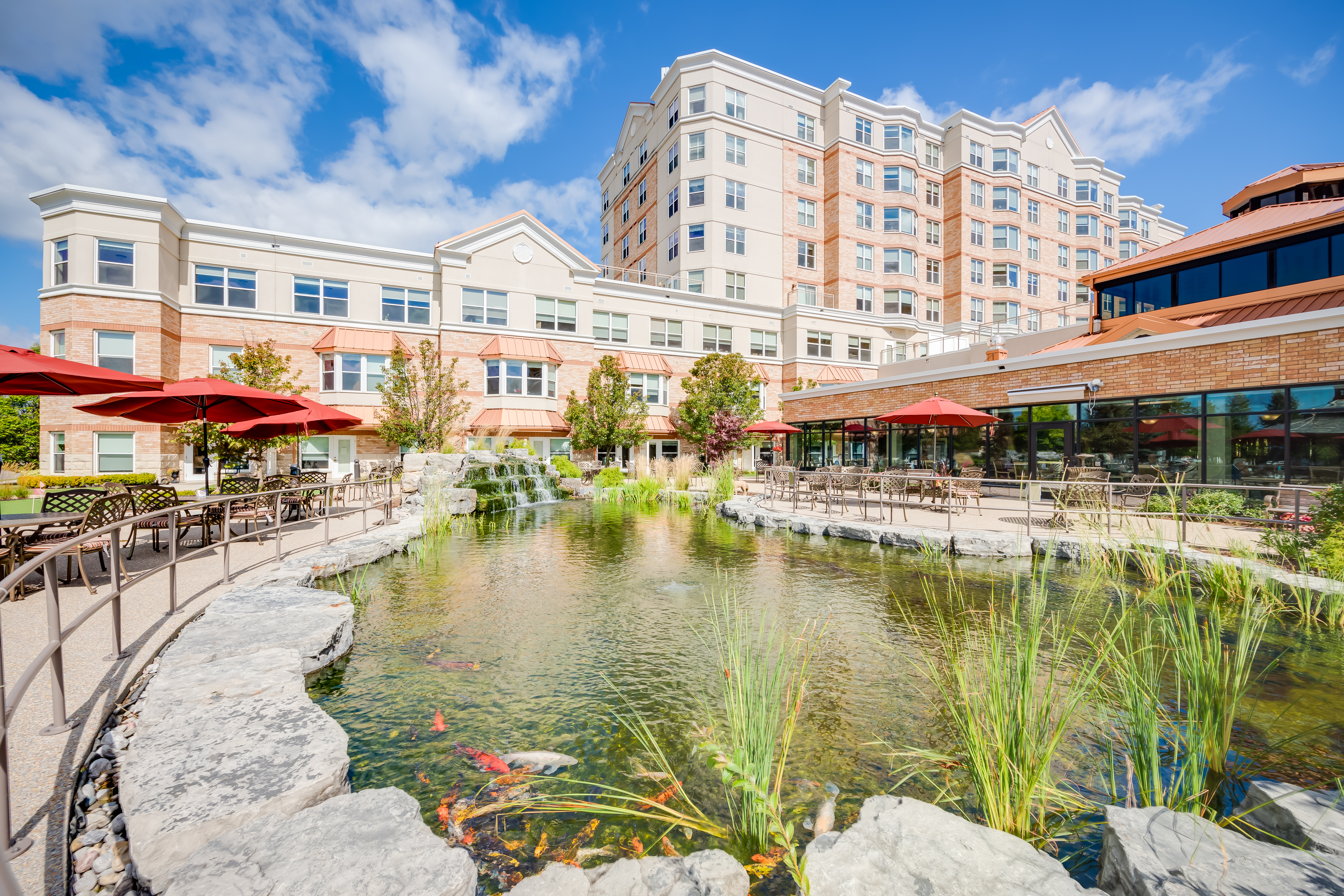 Outdoor view of The Village of Taunton Mills Retirement at the pond