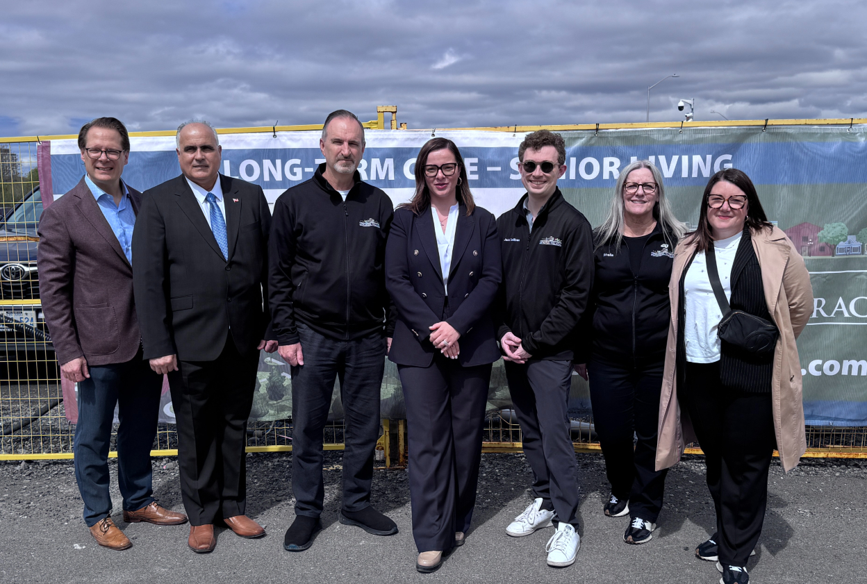 Jamie Schlegel is joined by the minister of long-term care and fellow team members during an official announcement celebrating to construction of The Village of Riverbank Terrace.