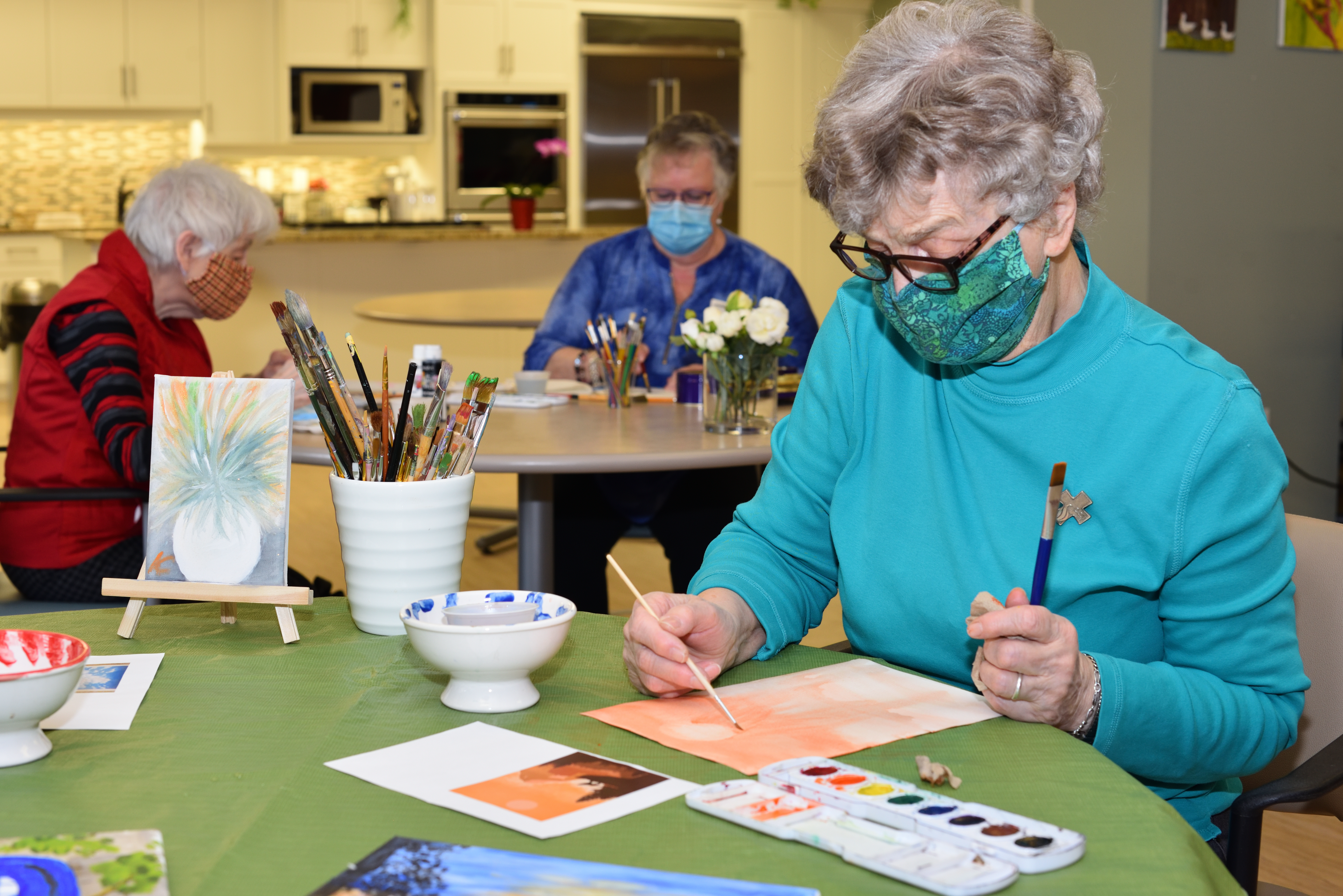 Residents participating in a watercolour class