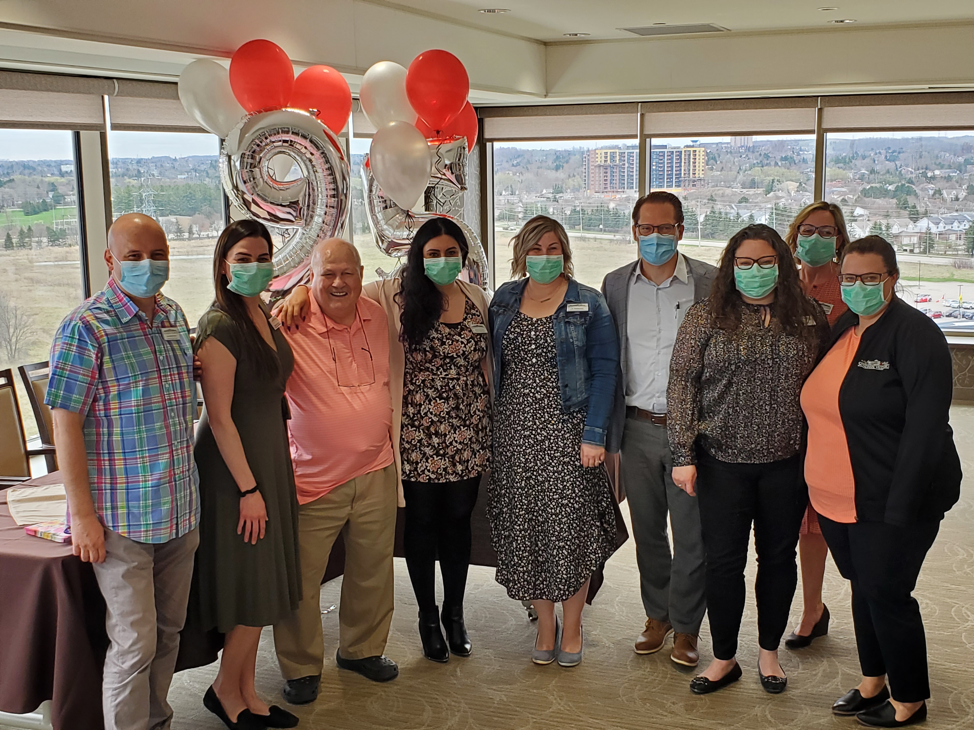 Ron and Jamie Schlegel were with the team from The  Village at University Gates to mark an amazing milestone as the Village is at near full capacity, filling up with new  residents, despite the challenges of the COVID-19 pandemic. 