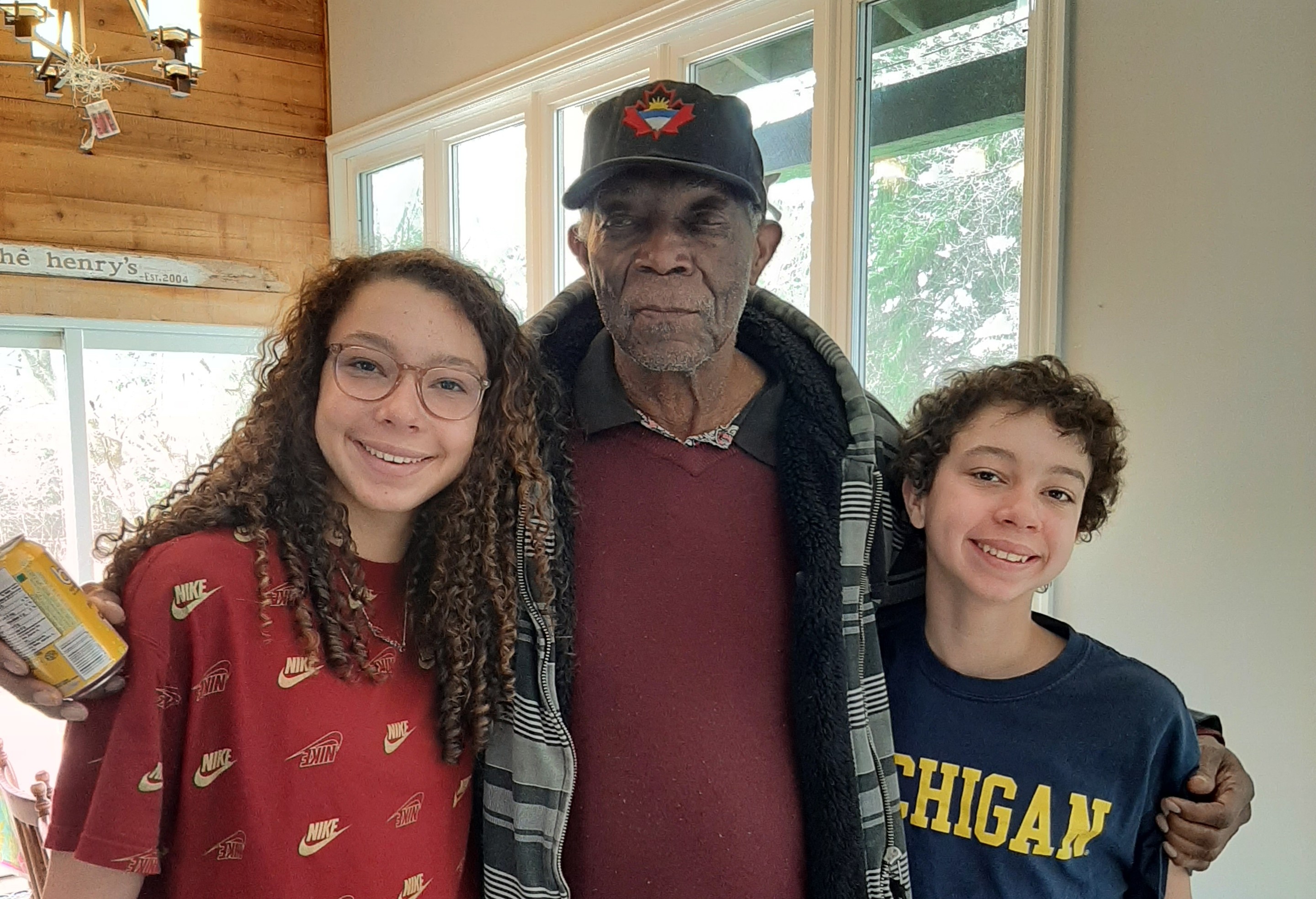 Vasil with his grandchildren, Emerson and Ronan. The children gave their Papa and his fellow residents the gift of music in a virtual piano concert
